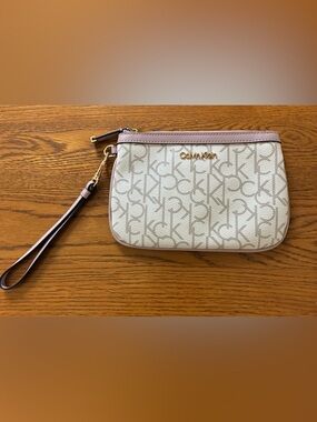 Calvin Klein Cream Logo Wristlet with Pink Trim -Like New